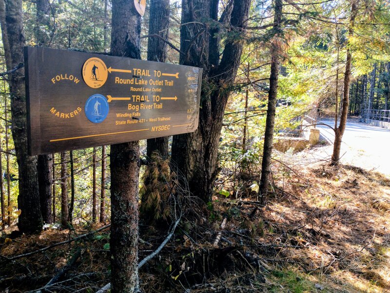 First trail junction near concrete bridge.