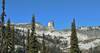 Chimney Rock (center) towers above a boulder field basin. The ridge on the left is part of the northeast shoulder of Mt. Roothaan, 7,326 ft. Both are on the Selkirk Crest.
