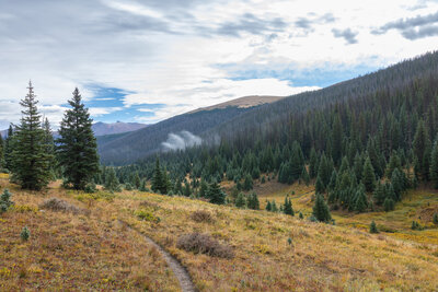 Low hanging clouds along the Cache La Poudre River.