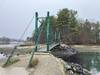 The Wiggly Bridge, teetering over Barrells Mills Pond.