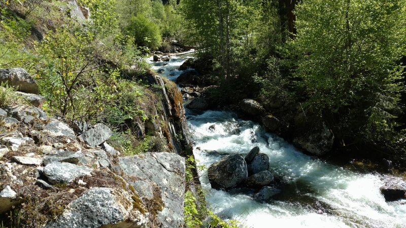 Sheep Creek cascades down its rugged valley bottom.