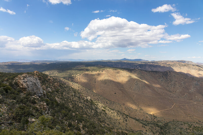 Clouds above the Scodie Mountains with Horse Canyon Road ahead.