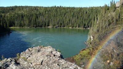 The rainbow from the Brooks Falls spray, and Monkman Creek far below.