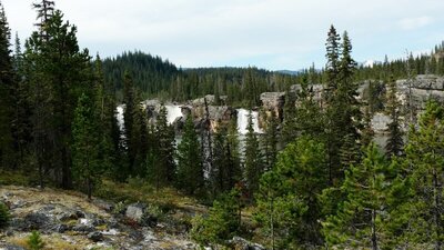 Monkman Falls is seen in the distance from Cascades Camp Trail.
