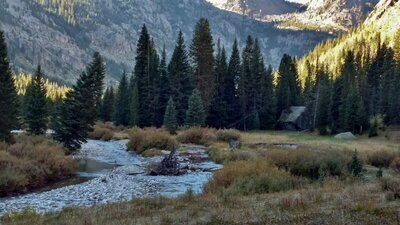 Early morning. New Fork River winding through meadows of New Fork Park, close to the head of New Fork Canyon.